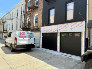 H&O Garage Doors service van outside Brooklyn townhouse during emergency garage door repair in NYC