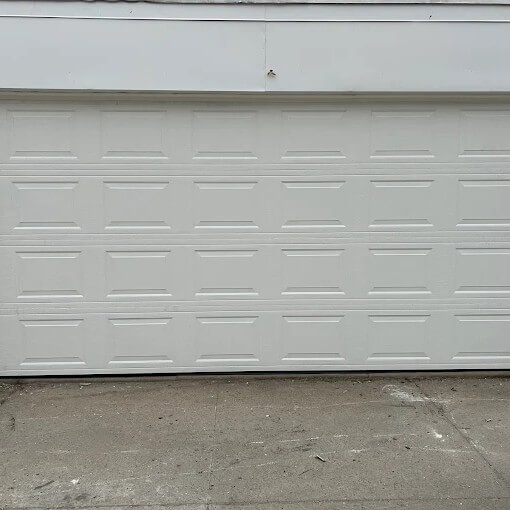 White sectional garage door replacement completed in Bronx, NY