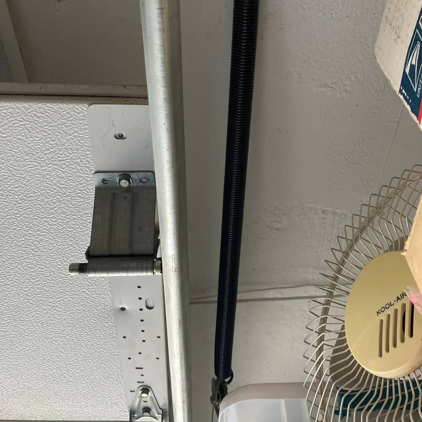 Garage door spring and track alignment service in Queens, NY