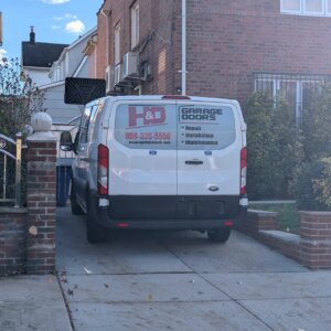 H&O Garage Doors service truck arriving for garage door repair in Queens, NY