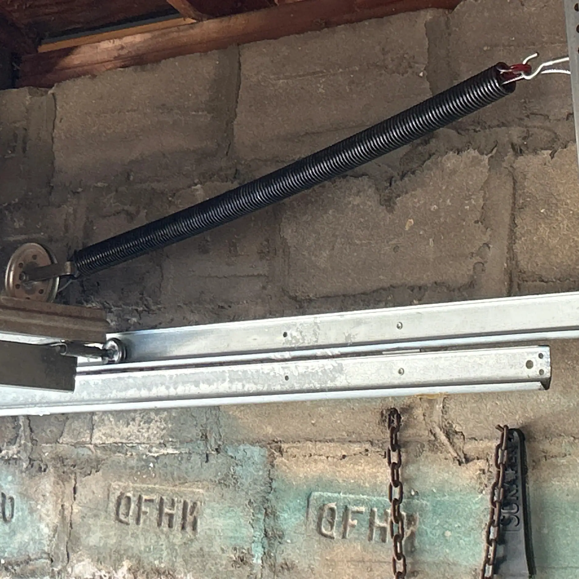 Garage door extension spring replacement performed in Queens, NY